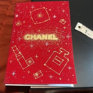 Empty Chanel box with blank card and gift bag